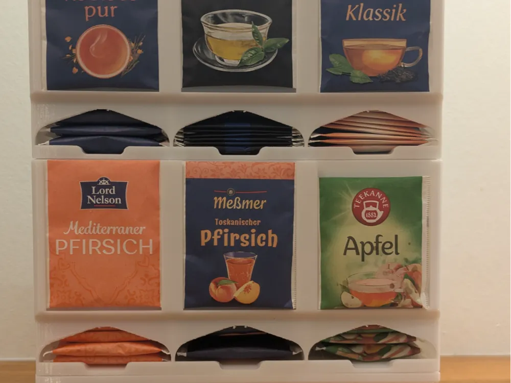 Close view of the printed tea rack filled with tea bags.